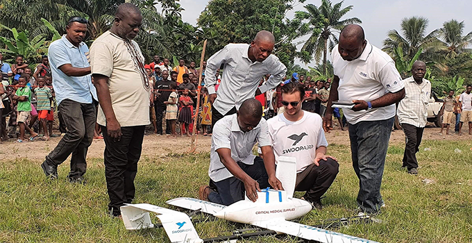 Eric Peck (Alumni) with drone in Vanuatu.