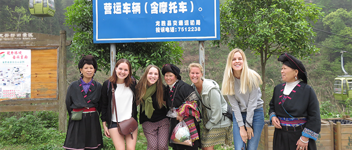 Several University of South Australia students on exchange with Hmong women
