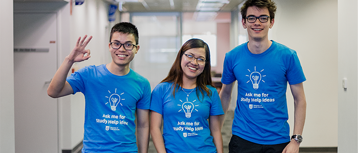 Three University of South Australia students wearing shirts that read Ask me for Study Help Ideas
