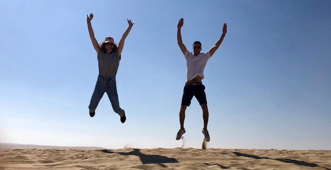 Lauren Waldhuter exploring sand dunes in Qatar