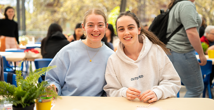 Photo of two female students at the R U OK