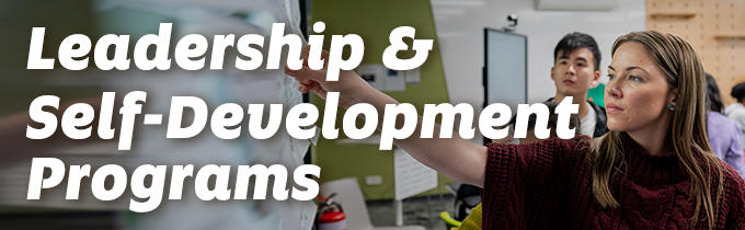 Advertisement banner promoting UniSA "Leadership & Self-development Programs", featuring image of students engaging in a workshop.