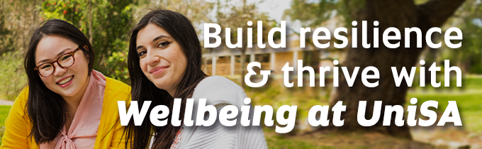 'Build resilience & thrive with Wellbeing at UniSA' advertisement banner featuring two female students outside at Magill Campus