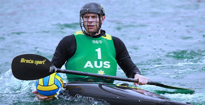 Image of Fred Sands competing in canoe polo