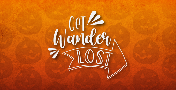 Orange "Get Wanderlost" branded banner with Halloween pumpkin background graphic