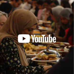 Photo of students and staff enjoying the food at Iftar Dinner, with YouTube logo as an overlay on the image