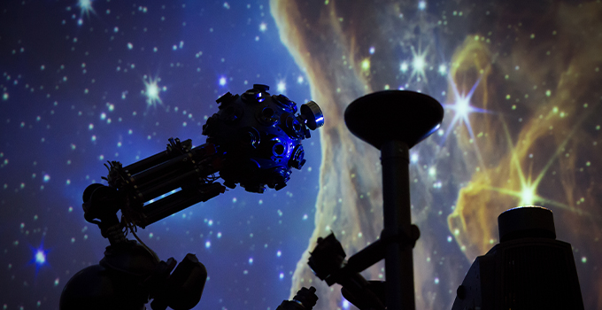 Adelaide Planetarium equipment with projection of stars in the background