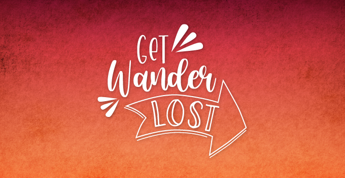 A white 'Get Wanderlost' logo on a textured burnt orange background.