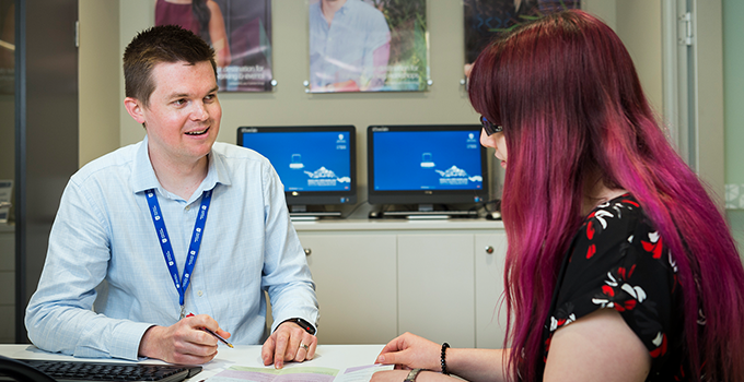 Photo of a student having a conversation with a Career Adviser